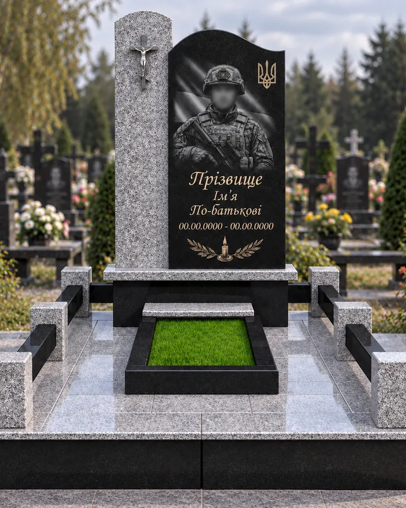 Пам’ятник військовому В-13 — пряма чорна стела з тризубом, портретом бійця і газоном на ділянці